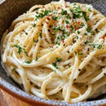 Welcome to the world of Garlic Parmesan Pasta Delight—a dish that embodies the essence of Italian comfort food. This creamy pasta dish is not just a meal; it’s an experience that brings warmth and joy to the dining table. With its rich flavors and delightful aromas, Garlic Parmesan Pasta Delight has become a favorite among home cooks and food enthusiasts alike. The appeal of pasta dishes in Italian cuisine is undeniable; they offer a harmonious blend of simplicity and sophistication, making them perfect for a casual weeknight dinner or an elegant gathering.
