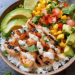 If you're searching for a vibrant and nutritious meal that is as delicious as it is visually appealing, look no further than the Grilled Shrimp Bowl with Avocado, Corn Salsa, and Creamy Garlic Sauce. This dish combines the succulent flavors of grilled shrimp with a medley of fresh ingredients, resulting in a wholesome meal that is perfect for any occasion. Whether you're hosting a summer barbecue, preparing a family dinner, or simply craving something refreshing, this shrimp bowl checks all the boxes.