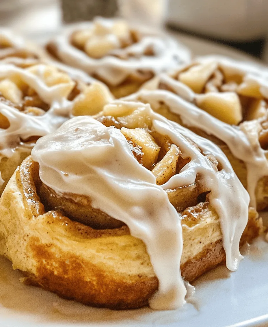 There's something undeniably comforting about homemade cinnamon rolls, an indulgent treat that combines warm, pillowy dough with the fragrant aromas of cinnamon and sugar. This classic breakfast item has captured the hearts of many, becoming a beloved staple in kitchens across the globe. However, when you elevate this traditional recipe with the addition of fresh apples and a luscious cream cheese frosting, you create a dessert that is not only irresistible but also bursting with flavor.