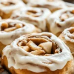 There's something undeniably comforting about homemade cinnamon rolls, an indulgent treat that combines warm, pillowy dough with the fragrant aromas of cinnamon and sugar. This classic breakfast item has captured the hearts of many, becoming a beloved staple in kitchens across the globe. However, when you elevate this traditional recipe with the addition of fresh apples and a luscious cream cheese frosting, you create a dessert that is not only irresistible but also bursting with flavor.